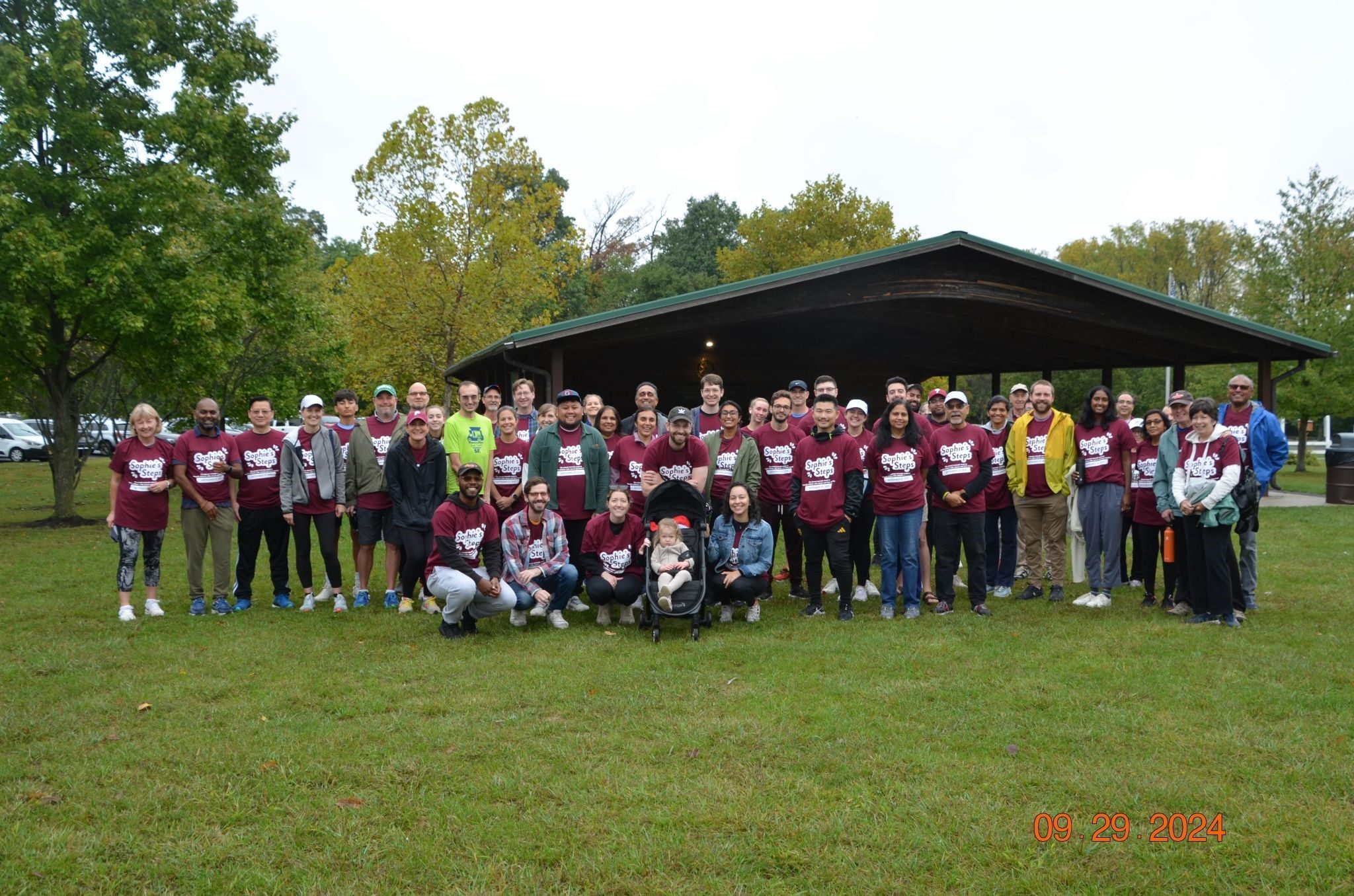 Community group photo at Sophie's Steps event