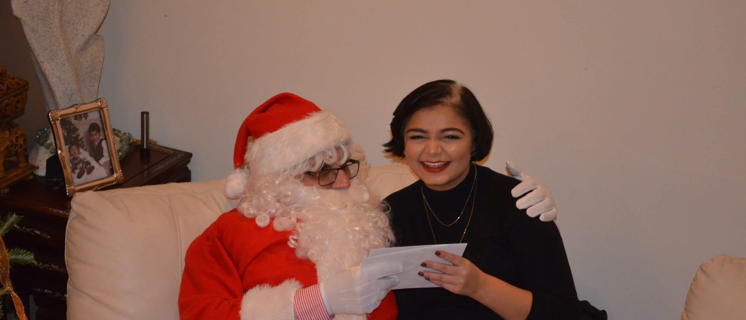 Sophie smiling with Santa